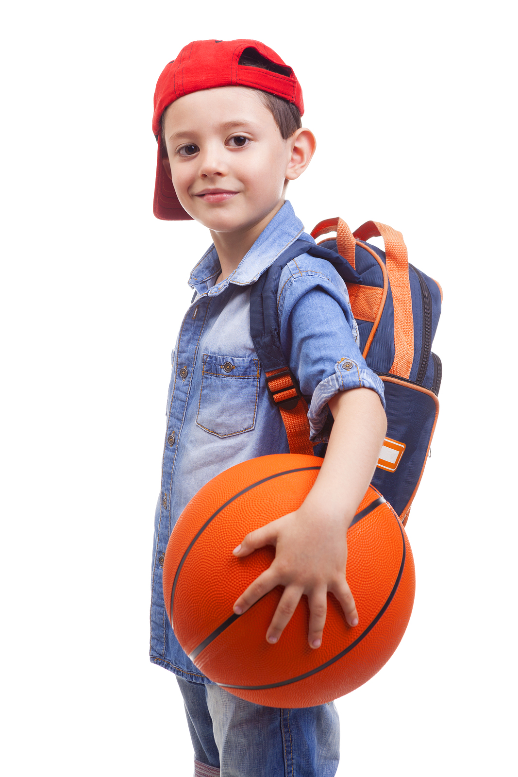 Portrait of a school kid holding a basketball, isolated on white Chakra Community